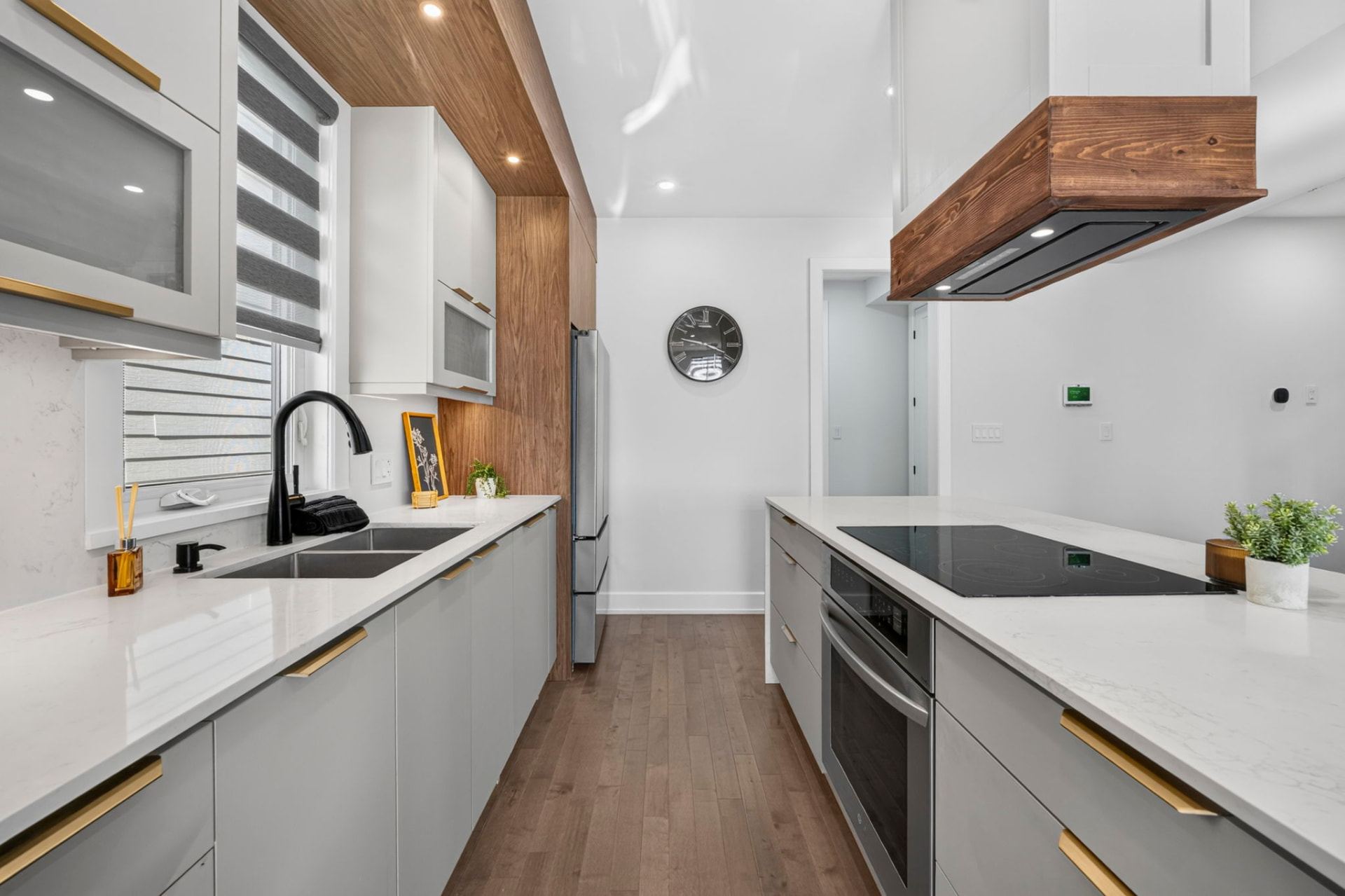 Kitchen galley with gold hardware